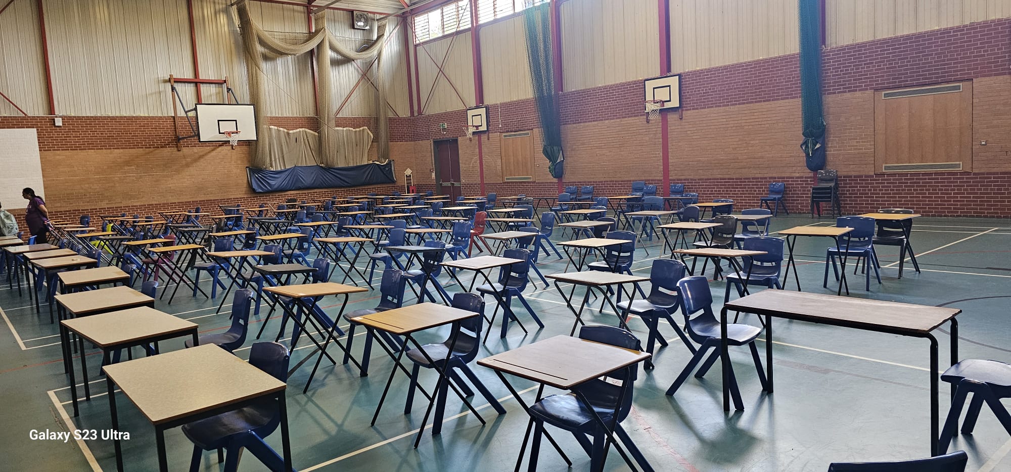 Answer sheets and pencils on a desk during a GLECTA 11+ mock exam